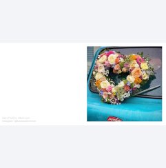 Hjärtkrans av blommor by Sara Thott